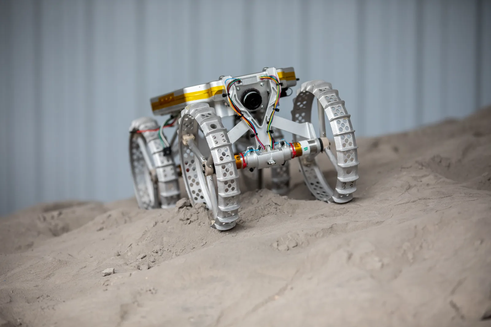 Astrobotic CubeRover prototype driving on simulated lunar soil at Kennedy Space Center