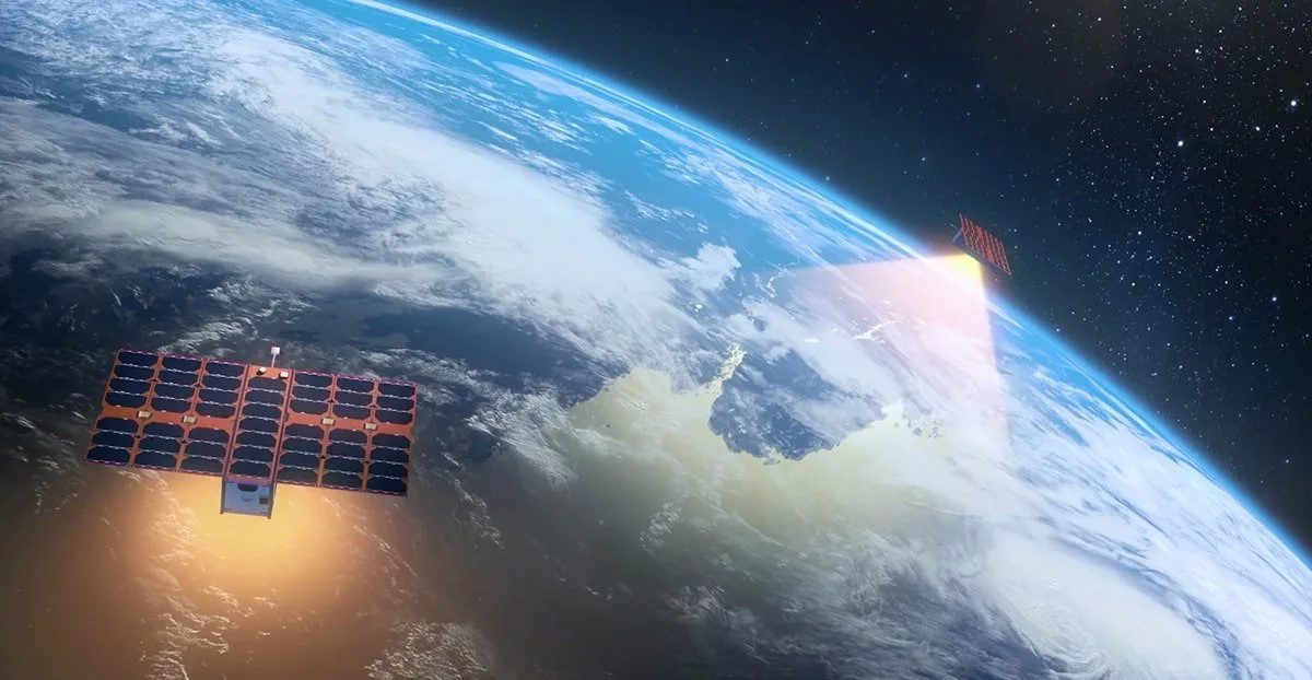 Illustration of an Astrocast IoT nanosatellite in orbit above Earth