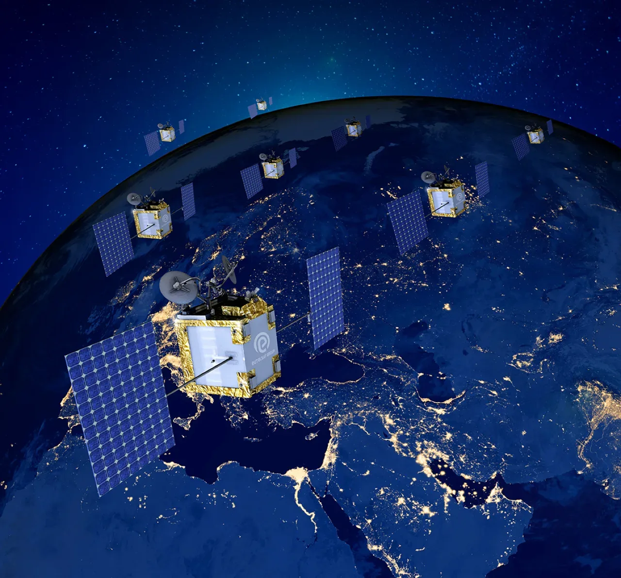 Render of OneWeb low Earth orbit satellites spread above Europe and the Middle East at night