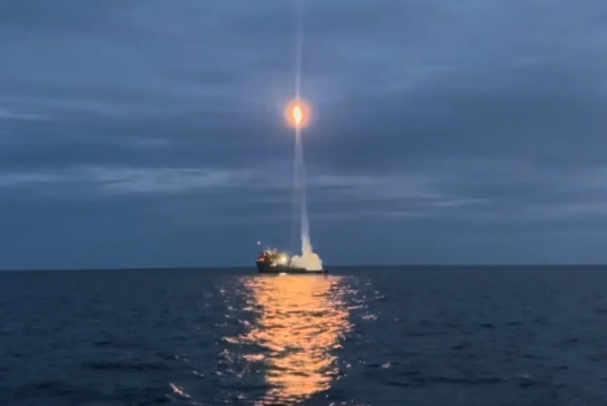 Evolution Space rocket lifting off from a vessel at sea at dusk