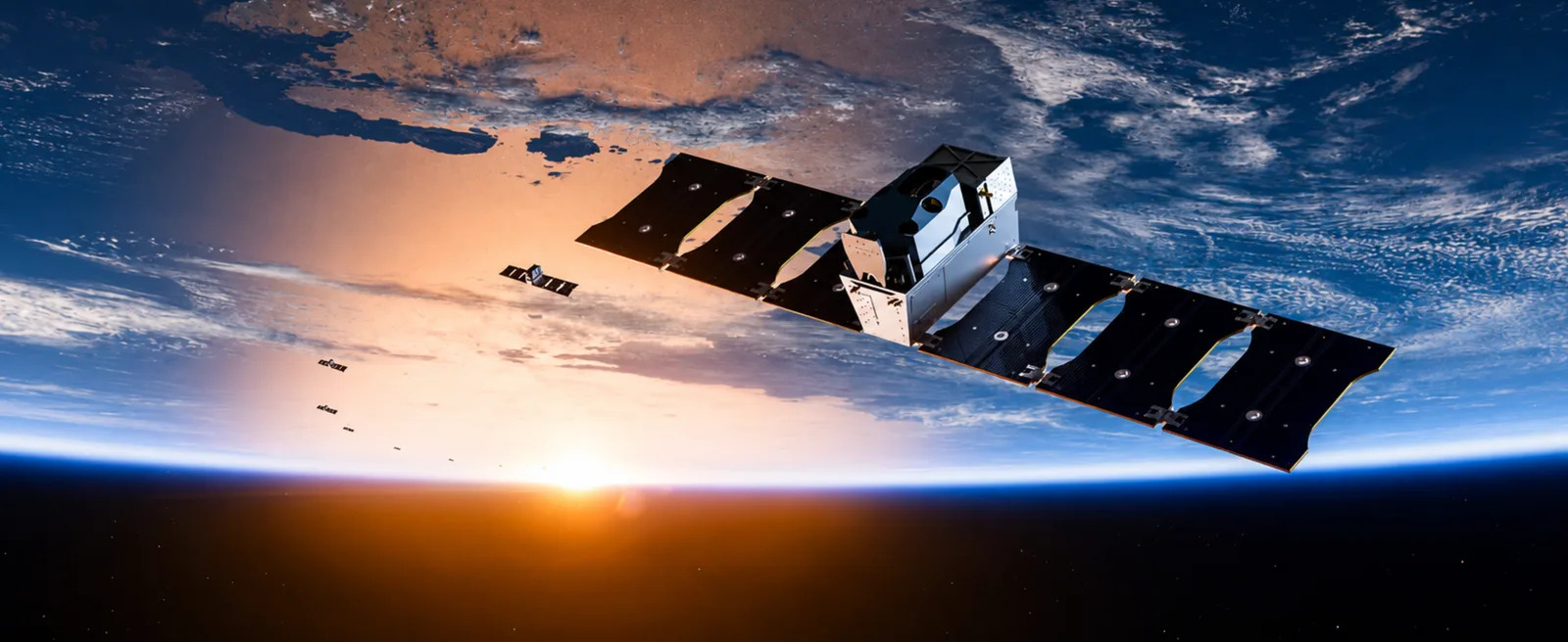 Rendering of a Hydrosat Osiris thermal imaging satellite orbiting above Earth at sunrise