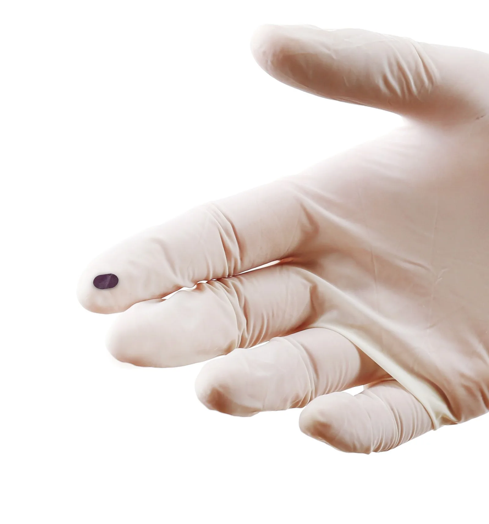A LambdaVision protein-based artificial retina held on a gloved fingertip before flight