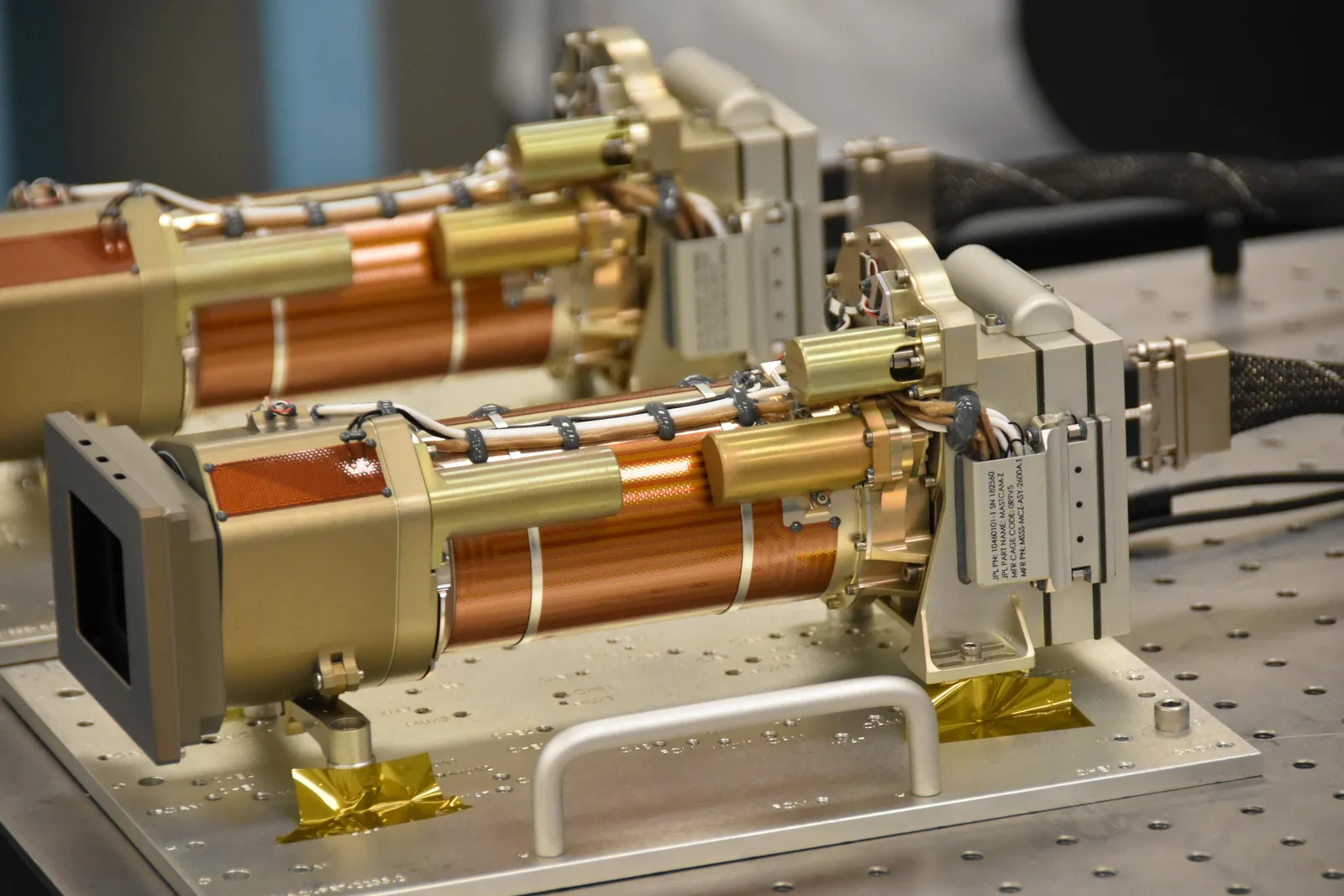 The two Mastcam-Z cameras on a workbench during assembly at Malin Space Science Systems in San Diego