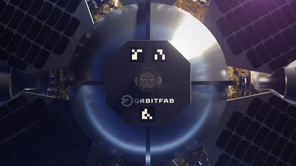 Close-up of the Orbit Fab RAFTI refueling interface with docking fiducials on a spacecraft