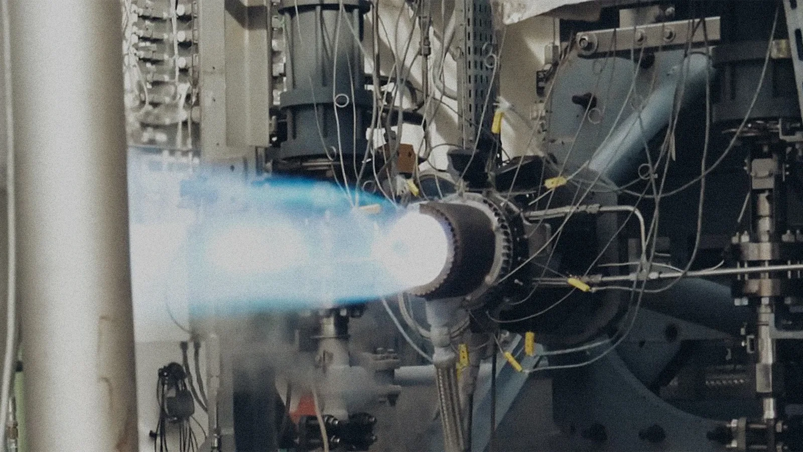 Pangea's methane and liquid oxygen aerospike engine firing during a hot-fire test on a horizontal test stand