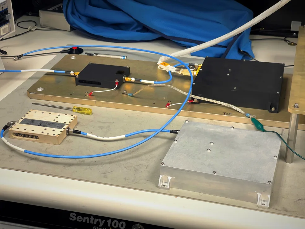 LuGRE GNSS receiver and low-noise amplifier hardware cabled together on a test bench at NASA Goddard
