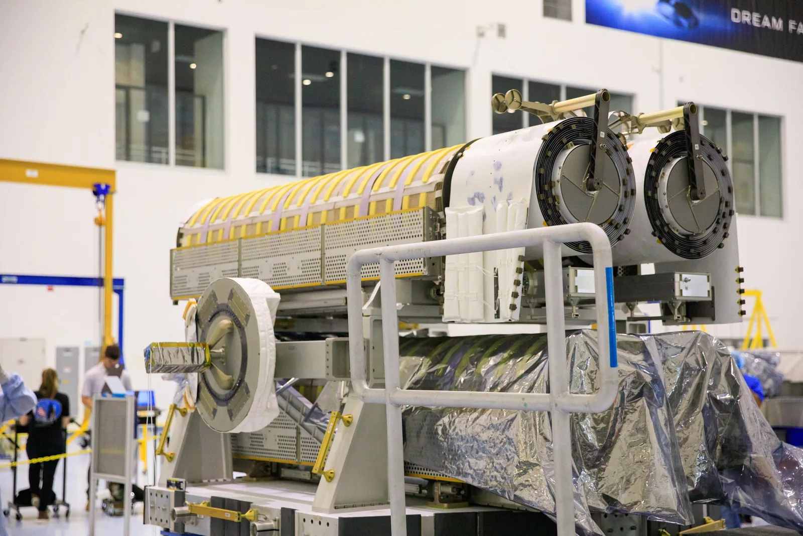 Rolled-up International Space Station Roll-Out Solar Arrays (iROSA) secured on a platform at Kennedy Space Center before launch