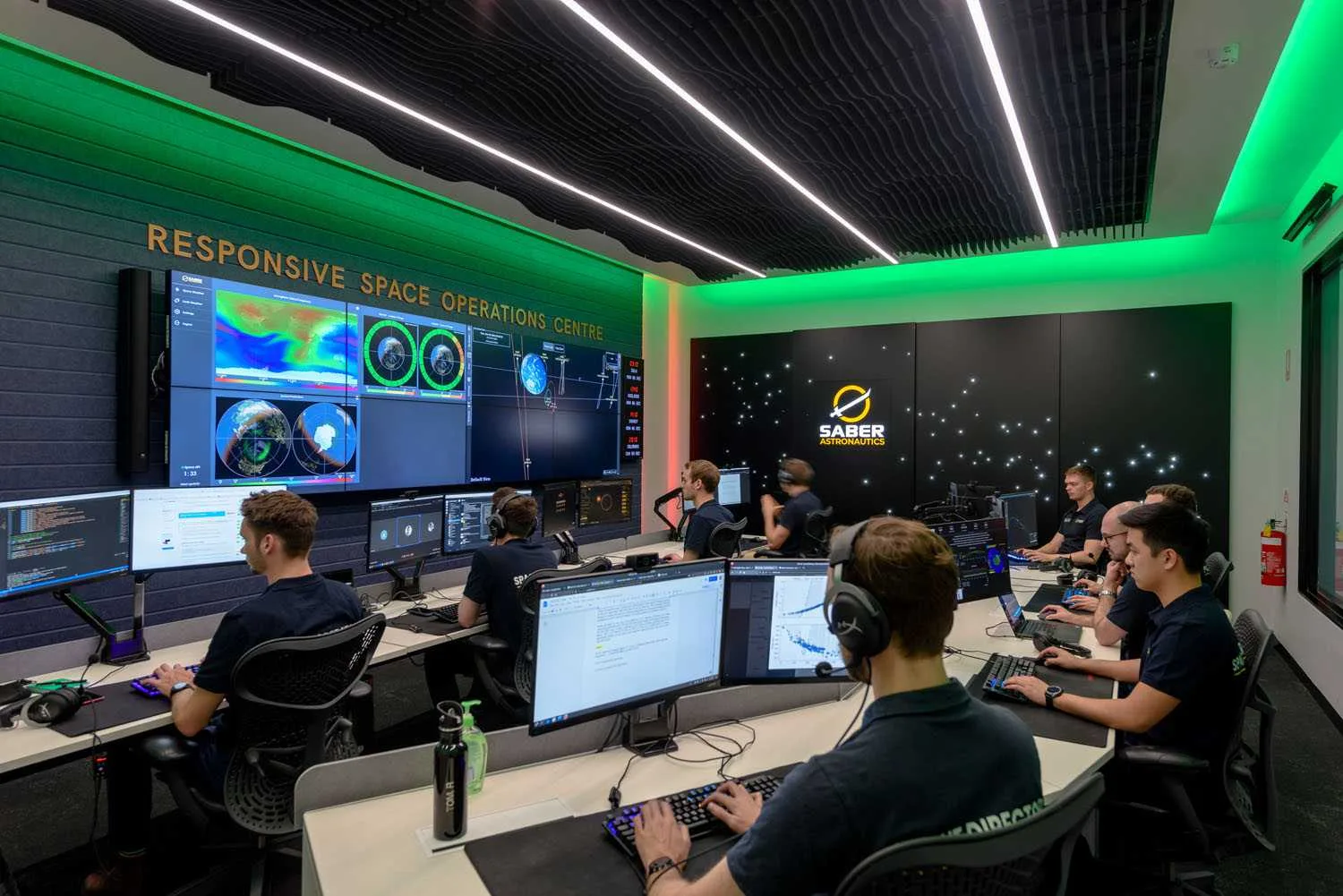 Operators at workstations inside Saber Astronautics' Responsive Space Operations Centre