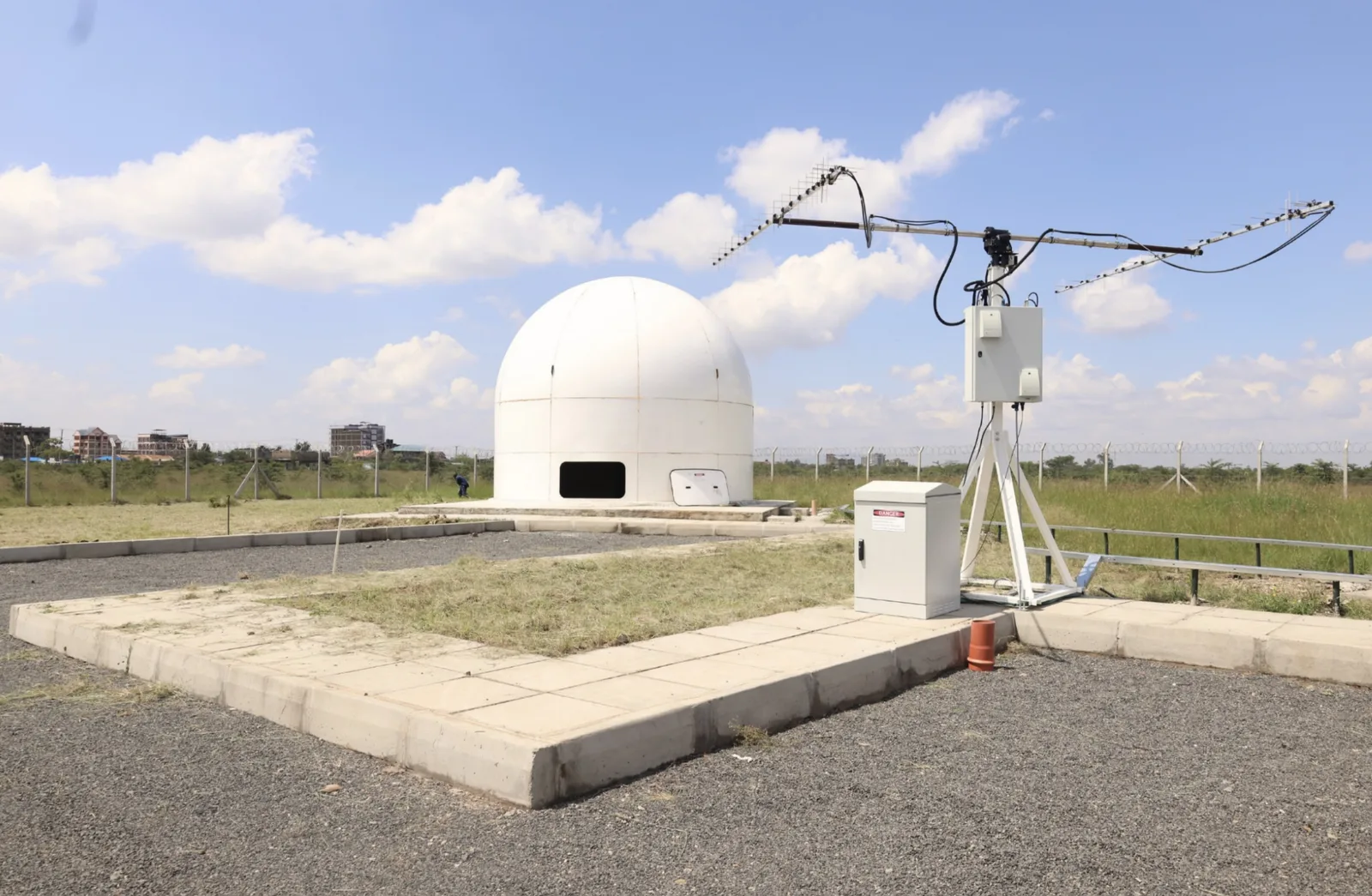 Skynopy ground station site in Kenya with a radome and an antenna array