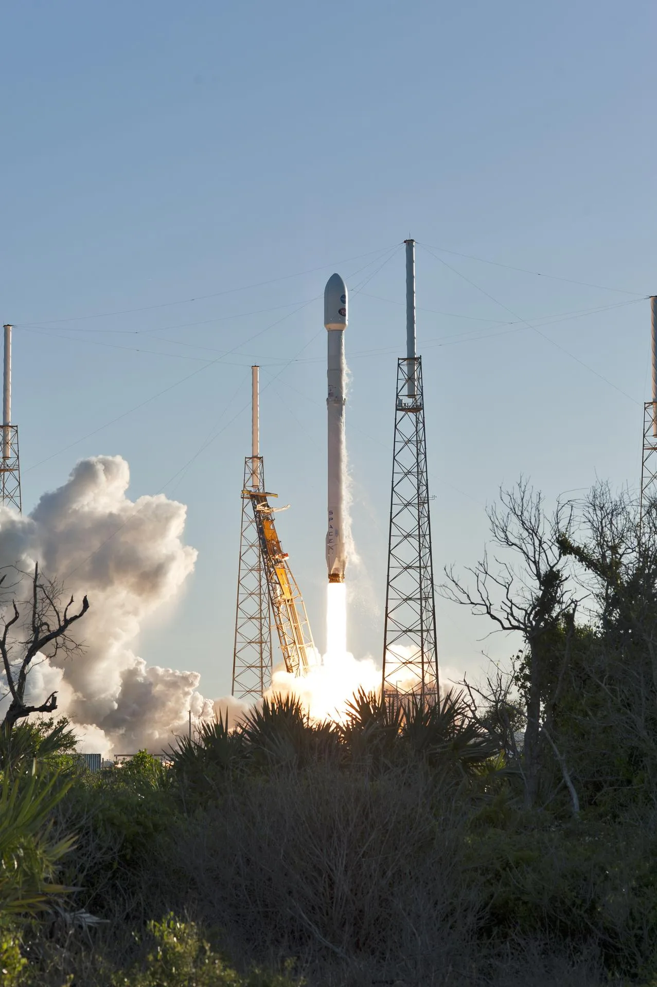 SpaceX Falcon 9 rocket lifting off from Space Launch Complex 40 at Cape Canaveral