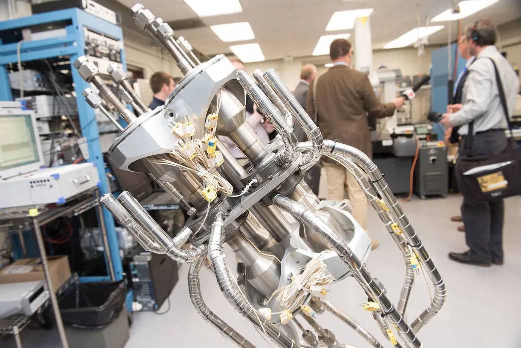 Kilopower power system prototype with its Stirling converters and heat pipes, on display in a NASA Glenn laboratory in 2018