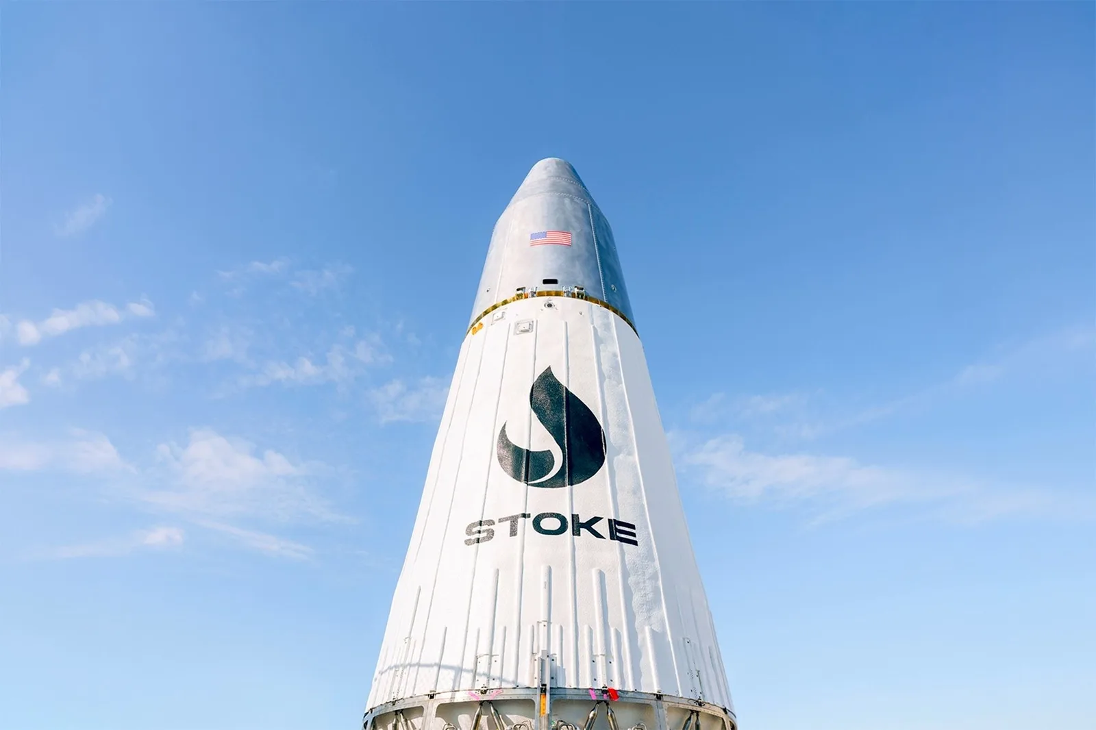 Nose of Stoke Space's Nova rocket against a blue sky